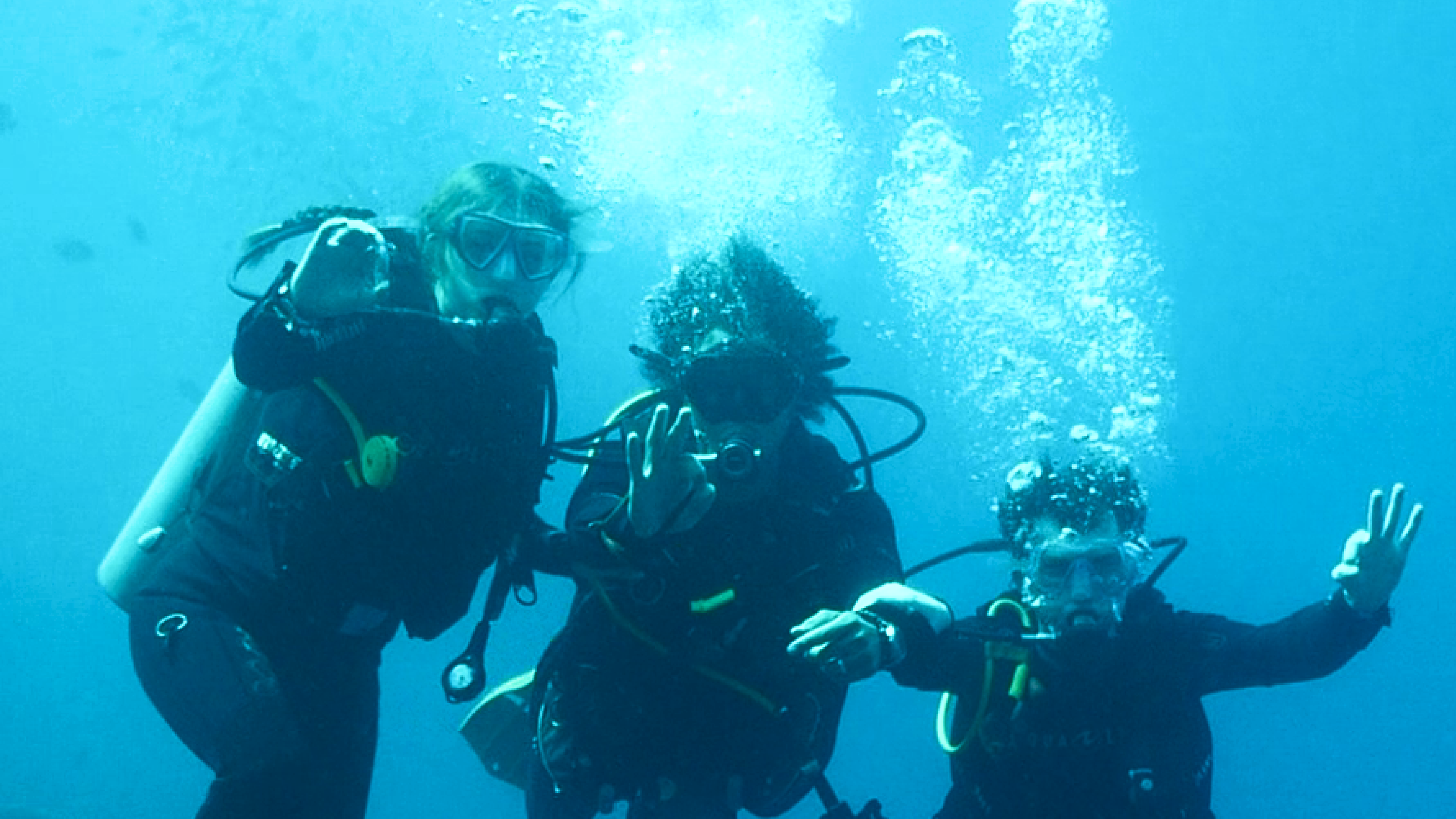 Silk employees dive during a team-building trip to celebrate the company's 10th birthday