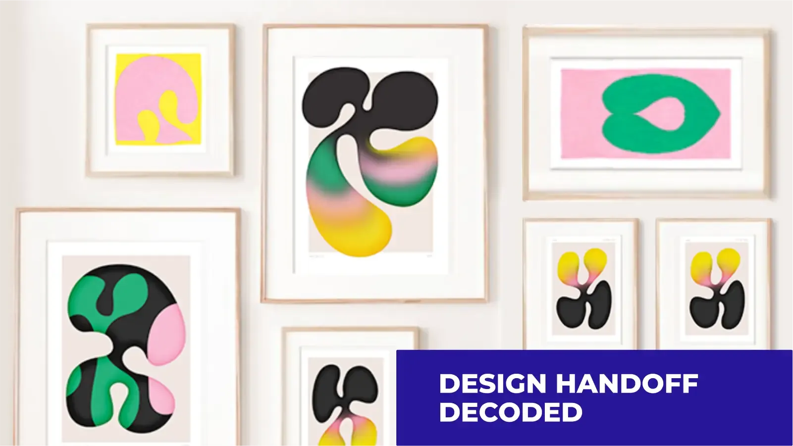 A wall of colorful posters of various shapes, sizes and styles. In the lower right corner, white writing on a blue background "Design handoff decoded"