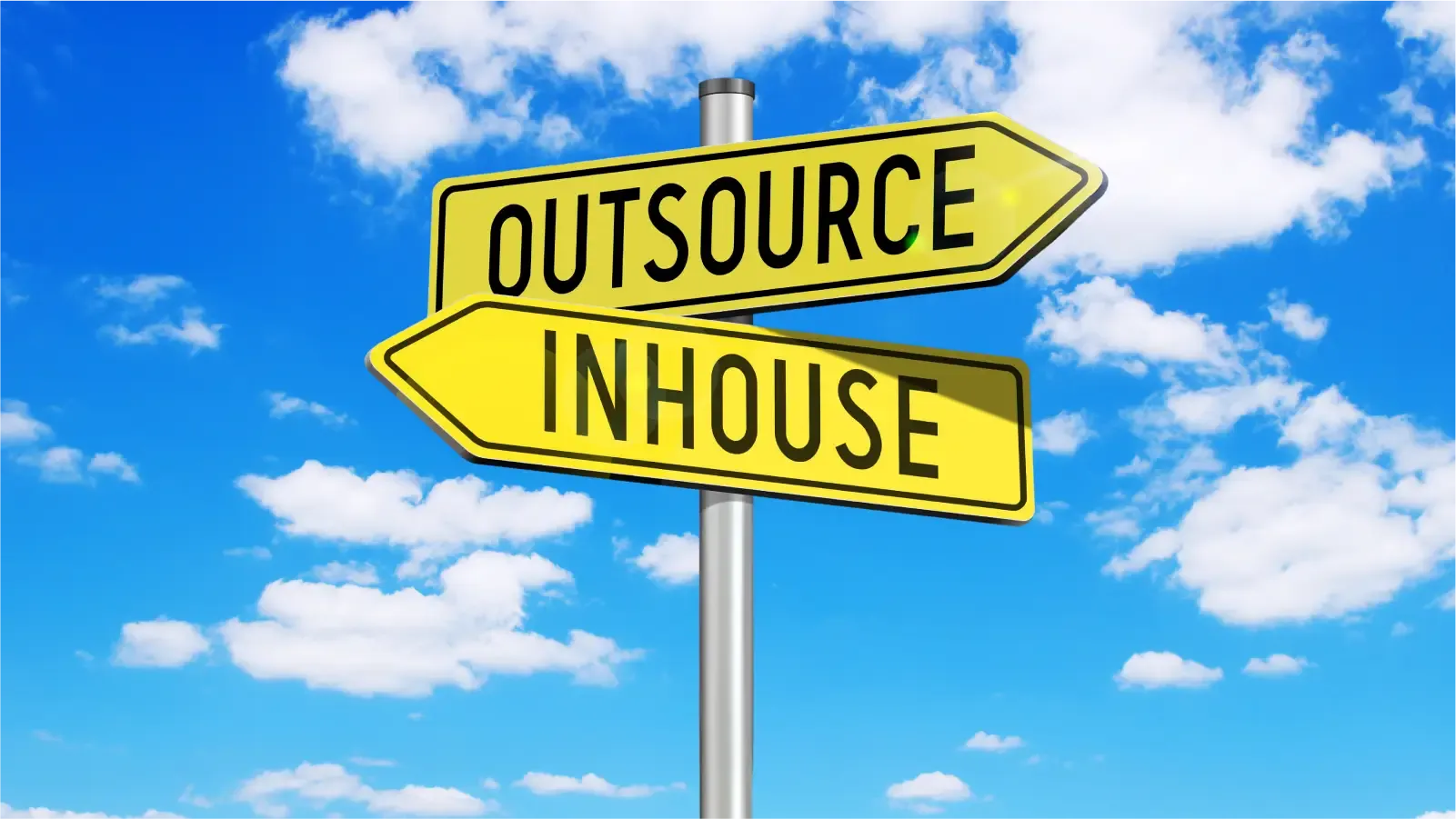 Image of a signpost with two arrows pointing in opposite directions. One arrow is labeled "Outsource," while the other is labeled "Inhouse."